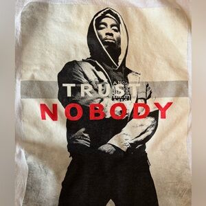 Tupac “trust nobody” white medium tee shirt.